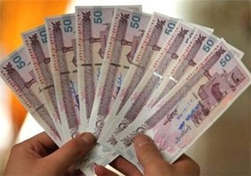 واحد پول ایران «تومان» شد